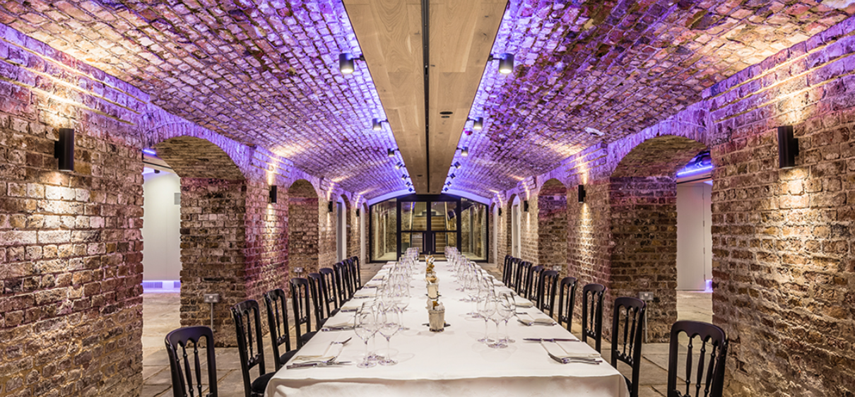 Table set up in the arches room of Glaziers Hall